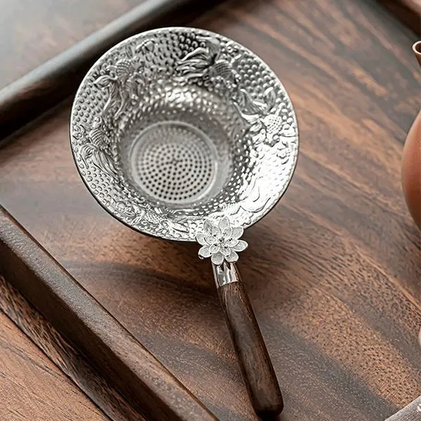 Plum gilt silver tea drain